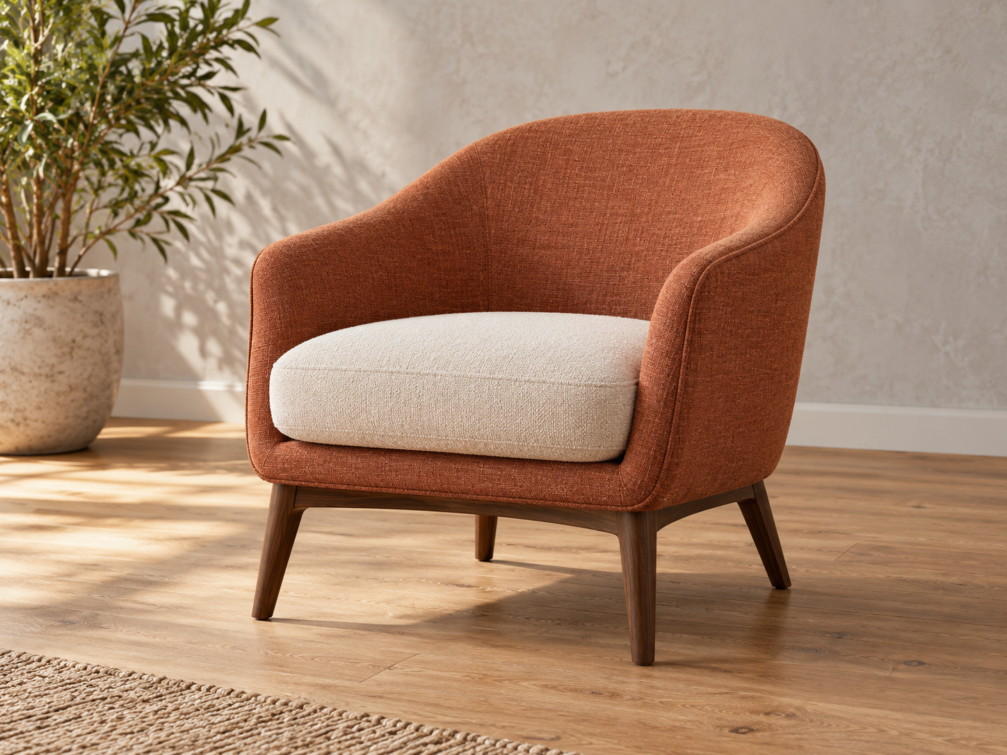 Terracotta lounge chair photographed in a furnished room before background removal